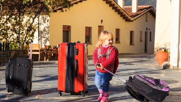 Girl with suitcases