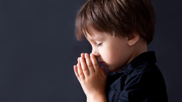 BOY PRAYING