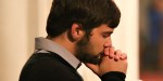 MAN PRAYING