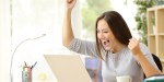 WOMAN BEHIND COMPUTER