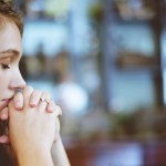 WOMAN PRAYING