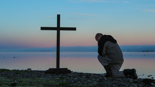 MAN PRAYING