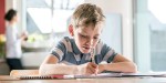 BOY DOING HOMEWORK