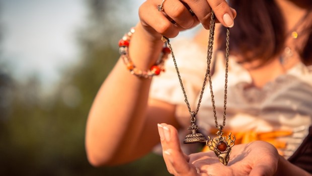 WOMAN WITH TALISMAN