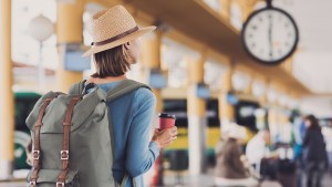 WOMAN,TRAIN STATION