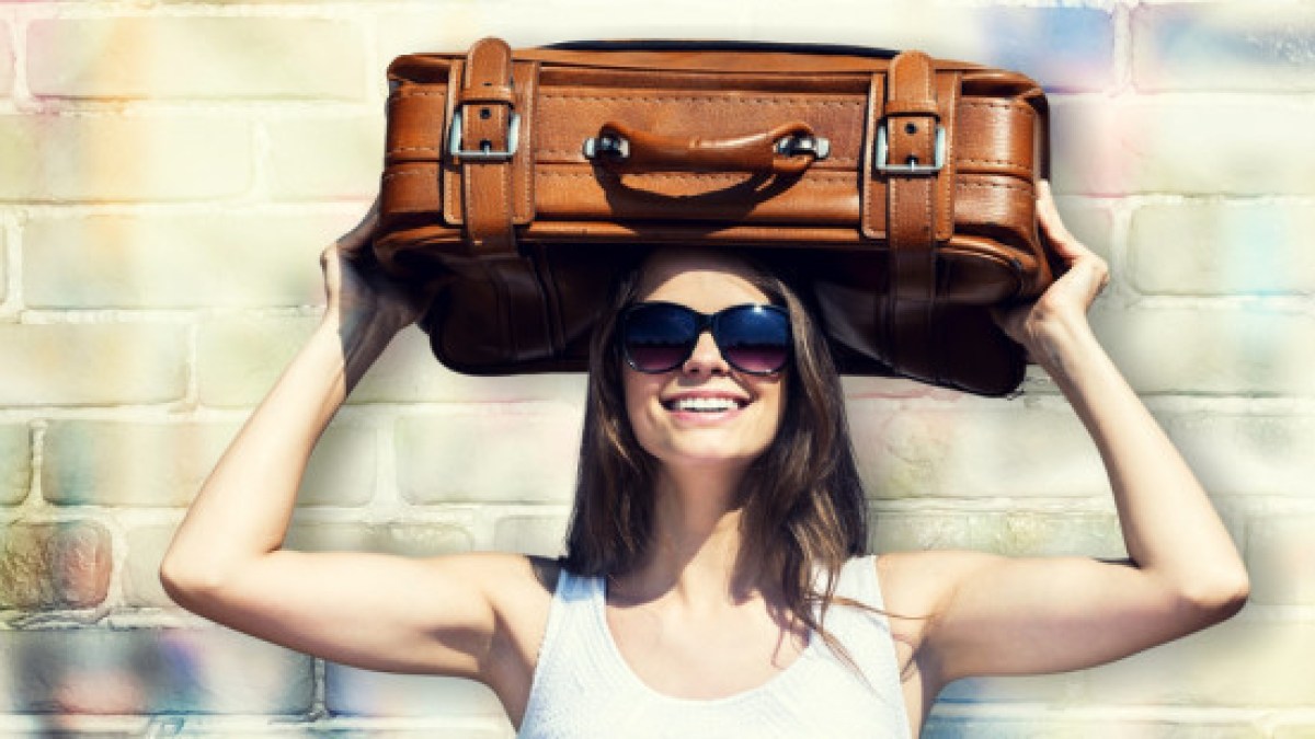 WOMAN WITH SUITCASE
