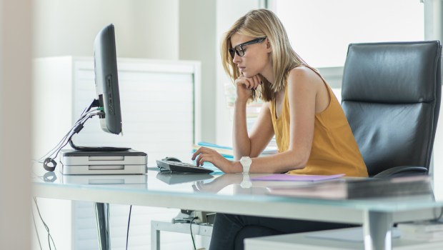WOMAN,WORKING,DESK,OFFICE