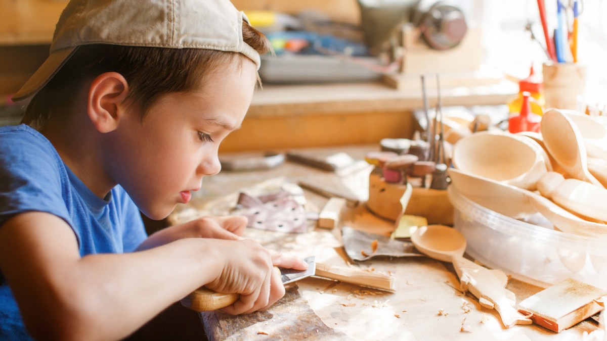 BOY CARVING