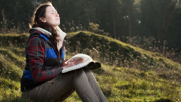 WOMAN,OUTDOORS,PRAYING