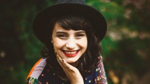 GIRL; SMILING; HAT