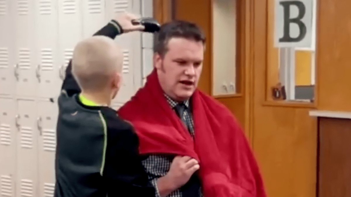 WEB 3 BOY SHAVES PRINCIPALS HEAD