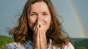 web3-woman-rainbow-sky-hands-folded-gratitude-shutterstock.jpg