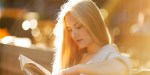 girl sitting and reading book