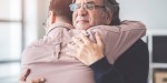 son hugs father