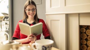 GIRL READING A BOOK