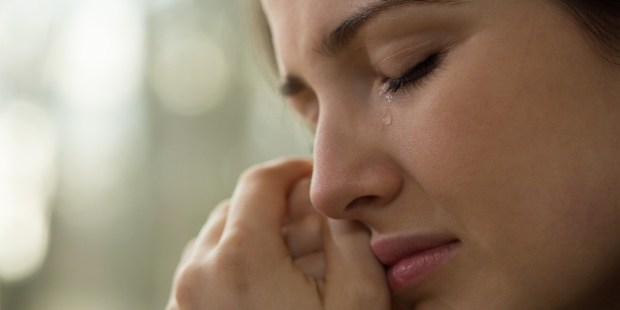 WOMAN CRYING,