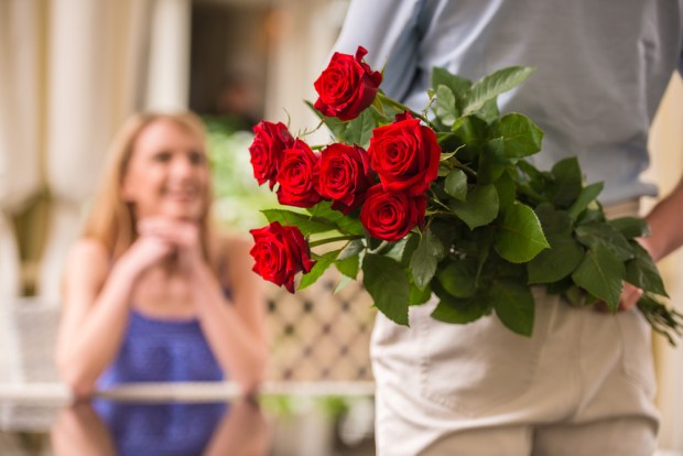 WOMAN RECEIVING ROSES