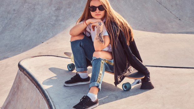 Teenage girl ripped jeans