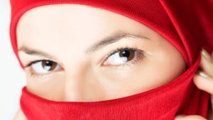 young woman in red veil