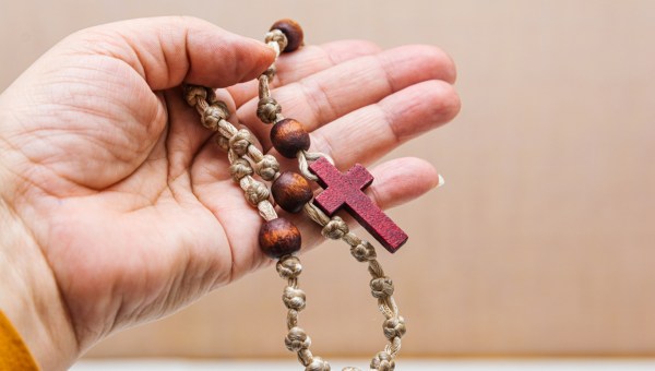 Rosary in hand