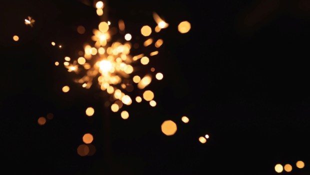 SPARKLING LIGHT ON BLACK BACKGROUND