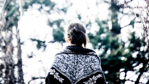 woman walking forest