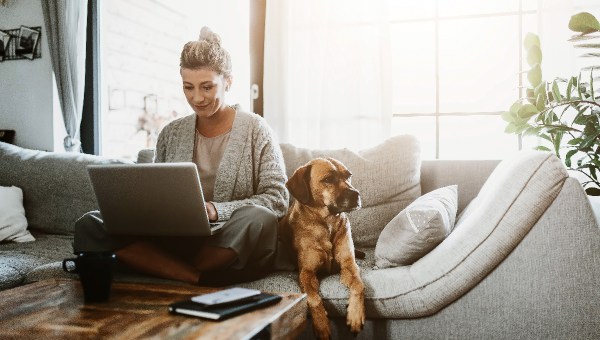 woman-working-computer-dog