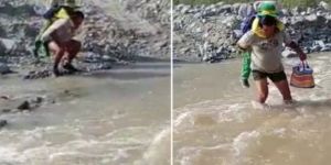 Učitelj svoje učence vsak dan nosi čez reko, da lahko pridejo k pouku