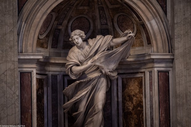 St-Veronica-holds-the-veil-with-which-she-wiped-the-face-of-Jesus-on-the-via-crucis