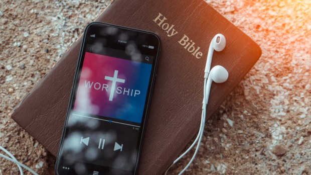 bible with phone and headphones