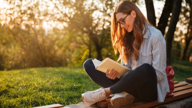 Girl reading outside