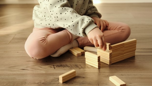 Little child plays a board game