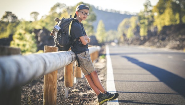 young boy travelling