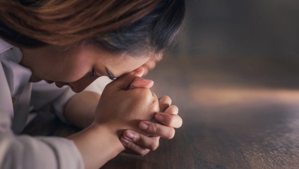 christianity background of saian woman praying for god blessing