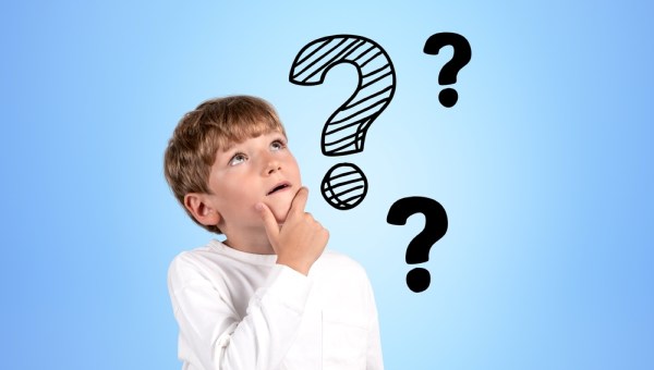 Smart boy student looking up