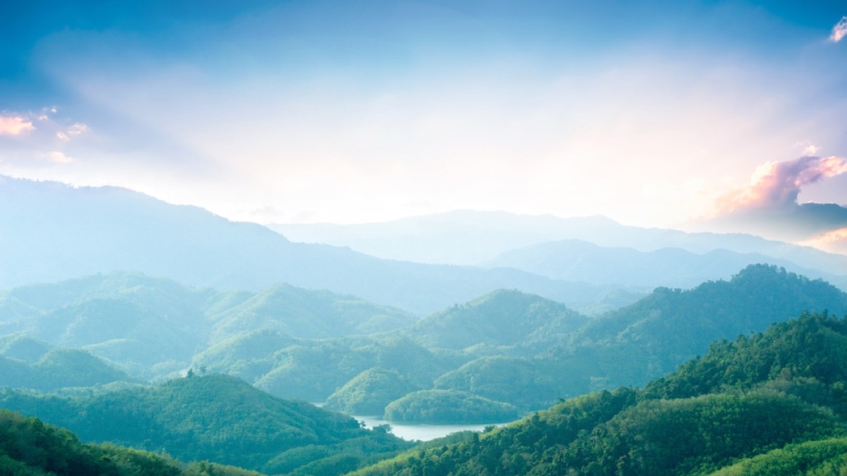 Green mountains and beautiful sky clouds under the blue sky