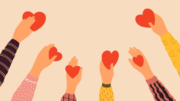 Hands holding hearts. Cartoon red symbol of love in human arms