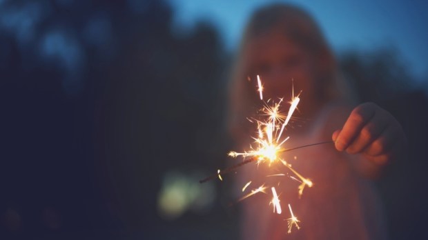 Shot of a unrecognizable little girl playing with a sparkler