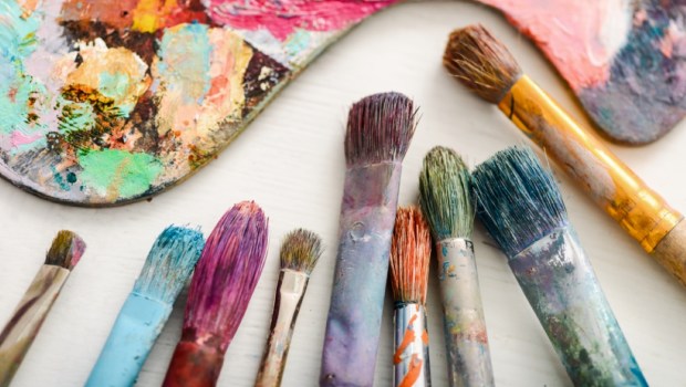 Dirty art supplies after painting a picture with oil paints