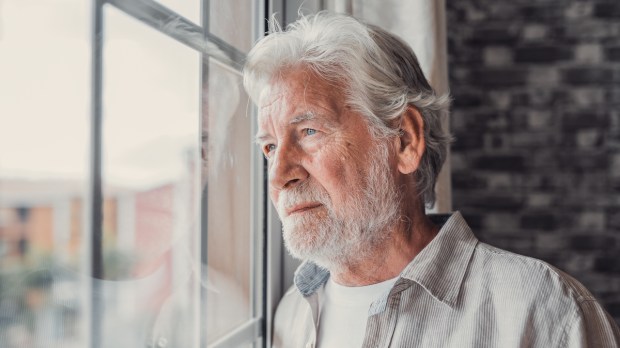 Pensive elderly mature senior man
