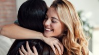 Shot of two lovely smiling women hugging each other