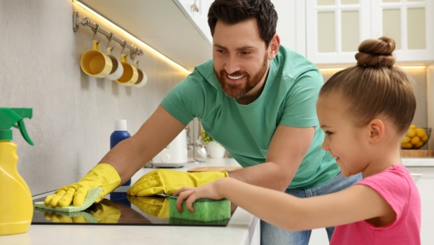 Dad and daughter spring cleaning