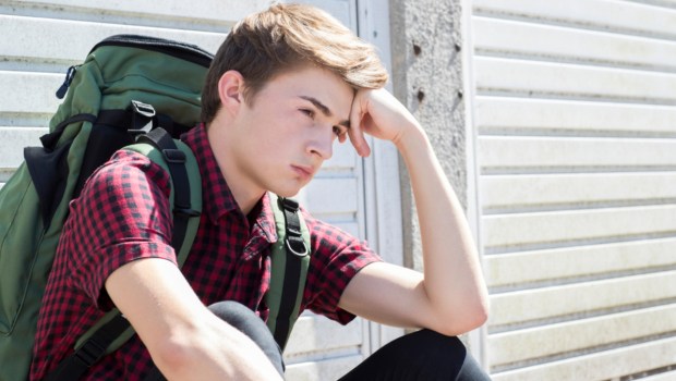 Vulnerable Teenage Boy On The Street After Leaving Home
