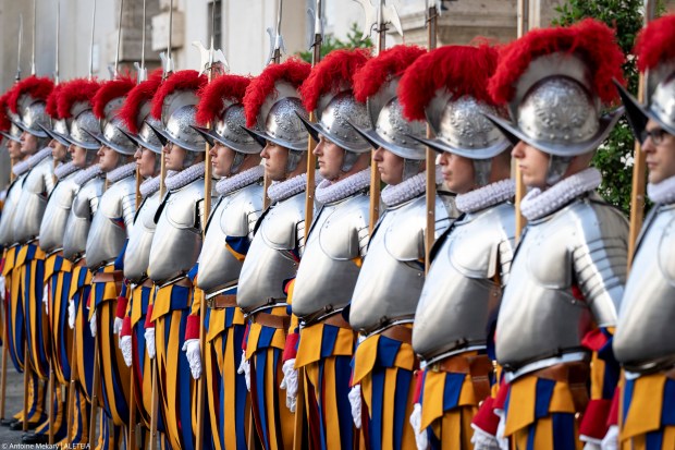 Swiss Guards take part in a swearing-in ceremony in San Damaso Courtyard, Vatican on May 06, 2024