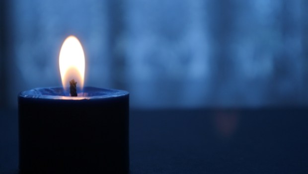 A Candle Flame In The Dark