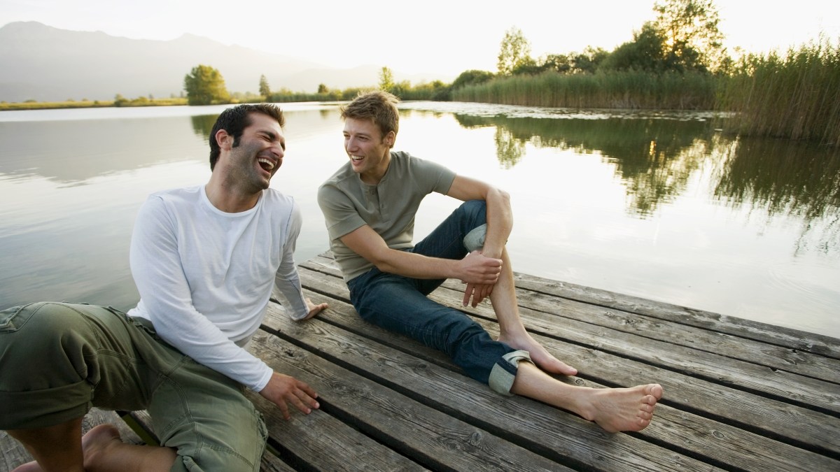 Two friends relaxing on the pier