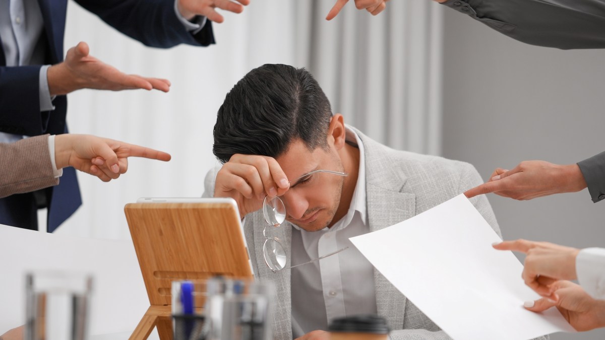 Making a mistake at work - finger pointing