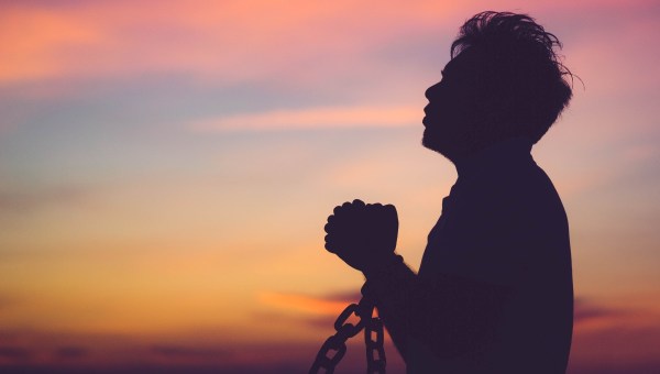 Silhouette man with chain Freedom