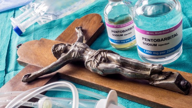 Crucifix with euthanasia drugs