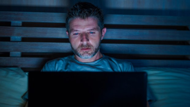 young attractive and relaxed internet addict man